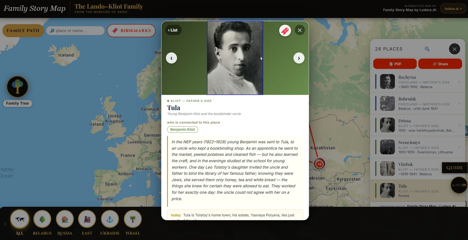 A place card open over the map: an archive portrait, the family member connected to the place, and the passage from the memoir describing it